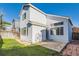 Exterior view of house, patio, and fenced-in backyard, perfect for outdoor enjoyment at 11580 Depew Ct, Westminster, CO 80020