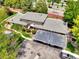 An aerial view of a charming home with a well-maintained backyard and a convenient carport at 8730 E Roundtree Ave, Greenwood Village, CO 80111
