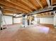 Spacious unfinished basement area with exposed ceiling, utilities, and laundry connections at 8730 E Roundtree Ave, Greenwood Village, CO 80111
