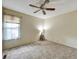 Bedroom featuring carpet flooring and bright natural light at 8730 E Roundtree Ave, Greenwood Village, CO 80111