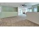Living room boasts carpet, fireplace, and sliding glass door access at 8730 E Roundtree Ave, Greenwood Village, CO 80111