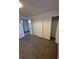 Bedroom with carpet and closet at 588 Empire St, Aurora, CO 80010