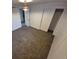 Bedroom with carpet and closet at 588 Empire St, Aurora, CO 80010