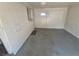 Enclosed exterior space with white painted brick and gray painted floor at 588 Empire St, Aurora, CO 80010
