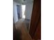 Hallway with carpeted floor and doorway at 588 Empire St, Aurora, CO 80010