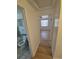 Hallway showing access to the bathroom and bedroom at 588 Empire St, Aurora, CO 80010