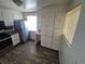 A kitchen featuring white cabinets, laminate countertops, and stainless steel appliances at 588 Empire St, Aurora, CO 80010