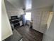 Kitchen with stainless steel appliances and ample cabinet space at 588 Empire St, Aurora, CO 80010