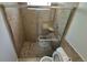 Bathroom features glass enclosed shower and tiled floor at 588 Empire St, Aurora, CO 80010