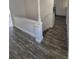 Stairway featuring vinyl floors and a white handrail at 588 Empire St, Aurora, CO 80010