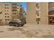 Apartment building with parking and well-maintained exterior at 13800 E Marina Dr # 112, Aurora, CO 80014