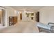 An open living room with an opening view into the kitchen area at 13800 E Marina Dr # 112, Aurora, CO 80014