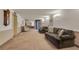Resident lobby area with comfortable couches and updated lighting at 13800 E Marina Dr # 112, Aurora, CO 80014