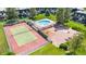 Aerial view of the pool, tennis court, playground, and picnic area at 6856 S Broadway, Centennial, CO 80122