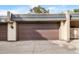 Spacious two car garage with an automatic door opener and concrete driveway at 6856 S Broadway, Centennial, CO 80122