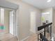 Upstairs hallway provides multiple rooms and closet access at 6856 S Broadway, Centennial, CO 80122