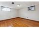 Well-lit room boasts hardwood floors and ample natural light through multiple windows at 4940 Fenton St, Denver, CO 80212