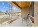 Covered front porch with iron railings, and a mid-century modern feel at 4940 Fenton St, Denver, CO 80212
