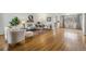 Spacious living room featuring hardwood floors, large windows, and stylish decor at 4940 Fenton St, Denver, CO 80212