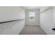 Walk in closet with ample shelving and a window providing natural light at 1324 Sienna Peak Cir, Erie, CO 80516