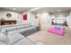 Finished basement with a sectional sofa, bar area, and a workout space, perfect for entertaining and fitness at 2679 Leafdale Cir, Castle Rock, CO 80109