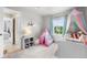 This playful bedroom features a window, a canopy bed, and a fun tent for imaginative play at 2679 Leafdale Cir, Castle Rock, CO 80109
