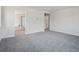Large bedroom with neutral carpet and an en suite bath with black hardware at 4741 Twelve Oaks Way, Castle Rock, CO 80104