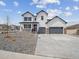 Charming two-story home with a three-car garage and modern farmhouse-style elevation at 4741 Twelve Oaks Way, Castle Rock, CO 80104