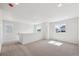 Bright loft area featuring neutral carpet, white walls, recessed lighting and natural light from multiple windows at 841 Alpine Ridge St, Erie, CO 80516