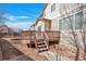 Backyard features wood deck with easy access to the home's interior at 21286 E Nassau Ave, Aurora, CO 80013