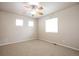 Bright bedroom with multiple windows, creating a spacious and welcoming atmosphere at 21286 E Nassau Ave, Aurora, CO 80013