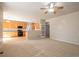 Open-concept design connects living room, kitchen, and dining area, creating a seamless flow at 21286 E Nassau Ave, Aurora, CO 80013