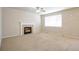 Bright living room with a fireplace and neutral decor, creating a cozy and inviting atmosphere at 21286 E Nassau Ave, Aurora, CO 80013