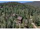 An aerial view of secluded wooded homes at 10438 Sunlight Ln, Conifer, CO 80433