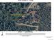 Expansive property extends across the street and backs up to 35 acres in a wooded location at 10438 Sunlight Ln, Conifer, CO 80433