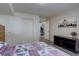 Nicely decorated bedroom with wood floors and a modern closet at 10438 Sunlight Ln, Conifer, CO 80433