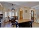 Cozy dining area with a table and chairs next to the kitchen, offering a charming spot for meals at 10438 Sunlight Ln, Conifer, CO 80433