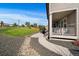 Well maintained backyard featuring a covered porch with a hot tub and fenced in yard at 16062 Red Bud Loop, Parker, CO 80134