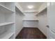 Well-organized walk-in closet with ample shelving and hanging space for optimal storage solutions at 16062 Red Bud Loop, Parker, CO 80134