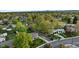 Neighborhood aerial view featuring green landscape and variety of home styles at 6390 W 47Th Ave, Wheat Ridge, CO 80033