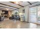 Large living area features a fireplace and a sliding glass door at 6390 W 47Th Ave, Wheat Ridge, CO 80033