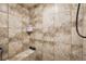 Tiled shower stall showcasing neutral tones at 6390 W 47Th Ave, Wheat Ridge, CO 80033