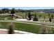 Beautiful community park featuring well-manicured lawns, walking trails, and scenic views at 3945 John Ave, Castle Rock, CO 80104
