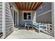 Outdoor patio with string lights, outdoor seating, and a small table at 3945 John Ave, Castle Rock, CO 80104