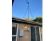 Exterior shot showcasing electrical box, light, meter and antenna at 1235 S Benton St, Lakewood, CO 80232