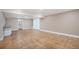 Unfinished basement featuring concrete floors and white walls, ready to be transformed at 19232 E Adriatic Pl, Aurora, CO 80013
