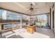 Covered patio with ceiling fan, wood flooring, and outdoor seating, perfect for relaxing at 19232 E Adriatic Pl, Aurora, CO 80013