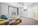 Spacious main bedroom with a window and ensuite bathroom, providing comfort and privacy at 19232 E Adriatic Pl, Aurora, CO 80013