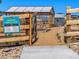 The Independence community garden featuring wooden planters and a greenhouse at 1308 E Hopkins Dr, Elizabeth, CO 80107