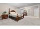 Bedroom boasts carpeting, natural light, a traditional bed frame, and an ensuite bath and walk in closet at 6728 S Catawba Way, Aurora, CO 80016